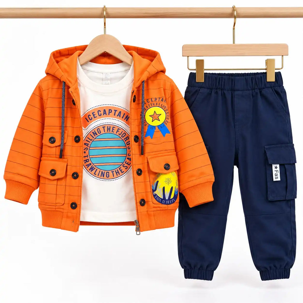 Young boy wearing Ice Captain orange hoodie jacket with graphic tee and navy blue cargo jogger pants – full outfit on model