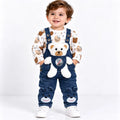 Baby boy wearing teddy bear denim dungaree set with printed shirt